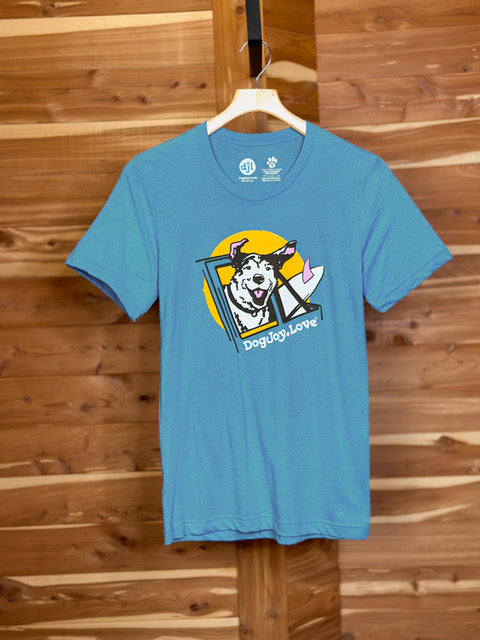 Aqua-colored unisex Bella Canvas graphic tee shirt of happy dog riding in a jeep